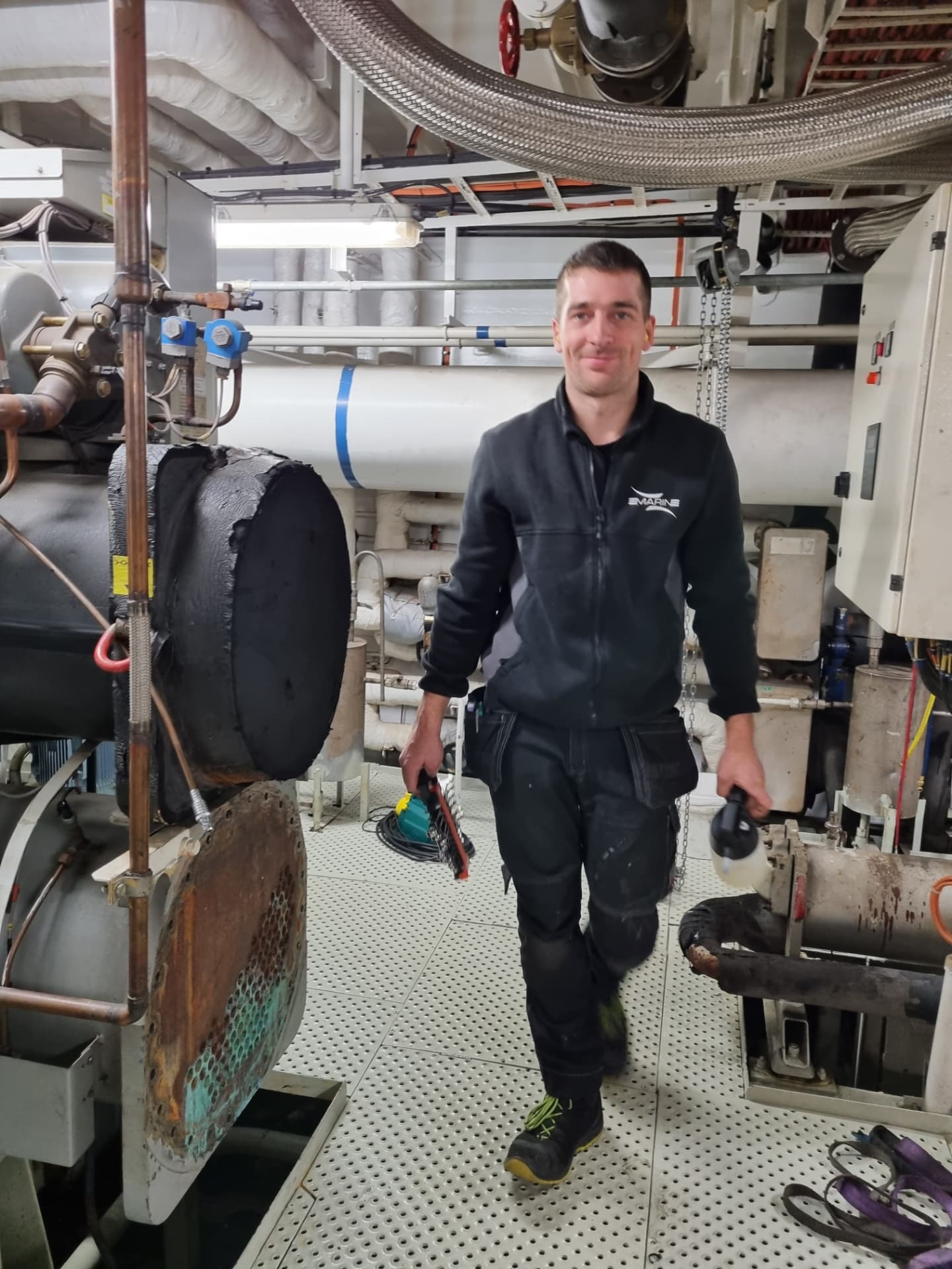 eMarine engineer working on chiller units on board